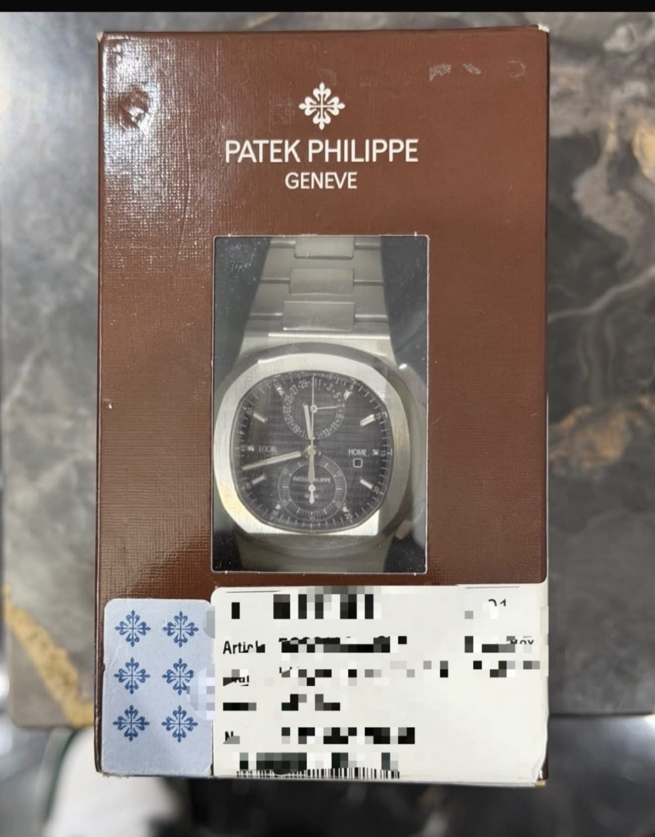 Patek Philippe Nautilus Travel Time Chronograph