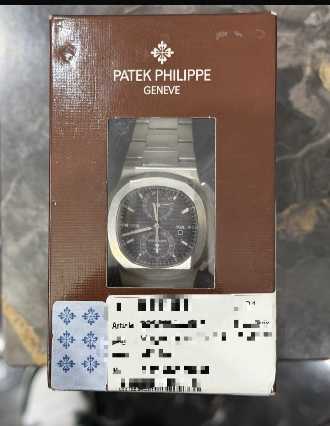 Patek Philippe Nautilus Travel Time Chronograph